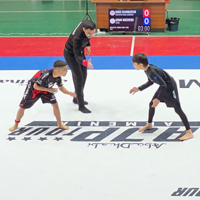 Referee starts the AJP Tour Kavkaz Jiu-Jitsu match as Mark faces his opponent